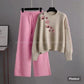 pink flapper with beige sweatshirt shoulder pink flowers